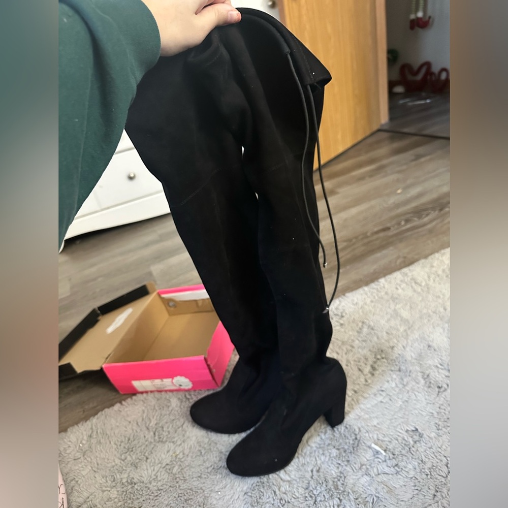 black thigh high boots
